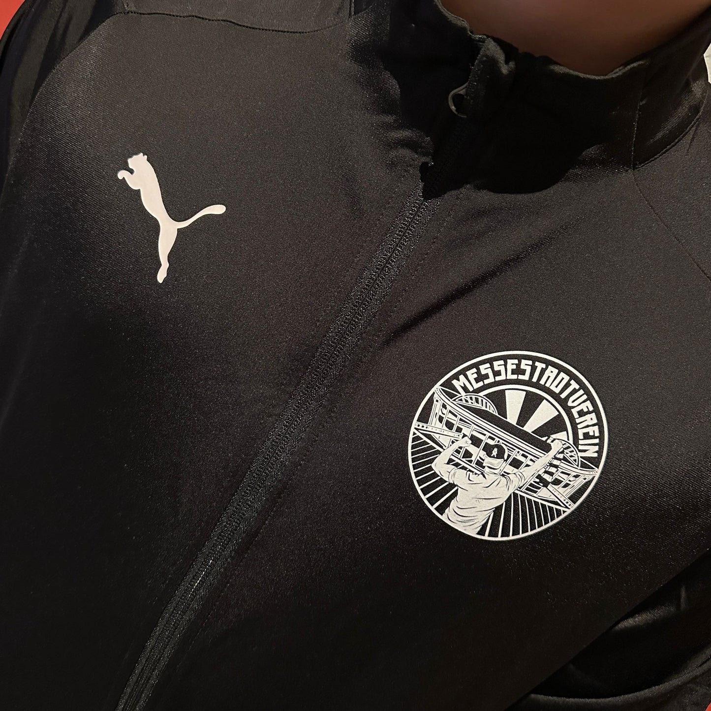 Puma Sportjacke schwarz "Messestadtverein"